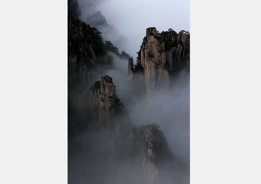 Mist shrouds Mount Huangshan in Anhui