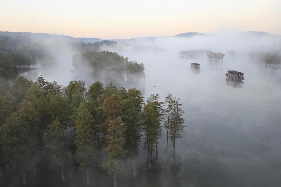 Fog-enveloped Tianquan Lake in Jiangsu