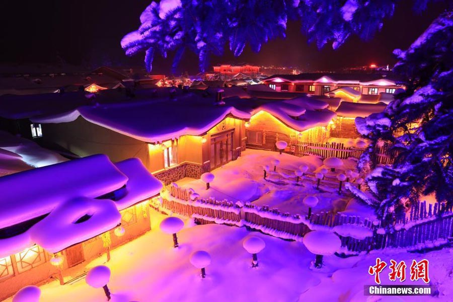 A nighttime winter wonderland in China's snow town