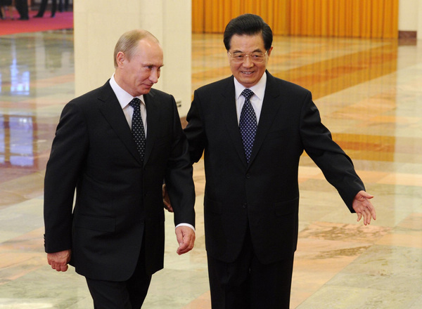 Hu meets Putin on bilateral ties