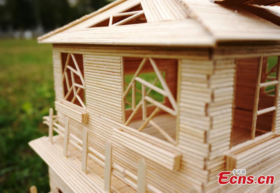 Students create 'villas' with small wooden sticks