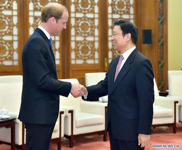 Xi gets royal invitation to visit UK during meeting Prince William