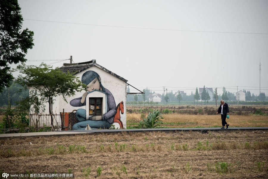 French street artist finds inspiration in Shanghai village