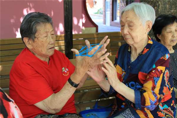 Photo exhibition held by daughters to call for attention for elderly parents