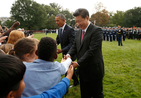 President Obama greets President Xi with <EM>nihao</EM> on state visit