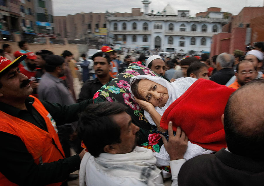 Survivors receive treatment in Pakistan after strong quake