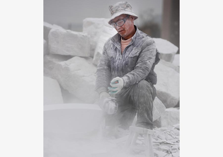 The snow-white world of a tombstone carver