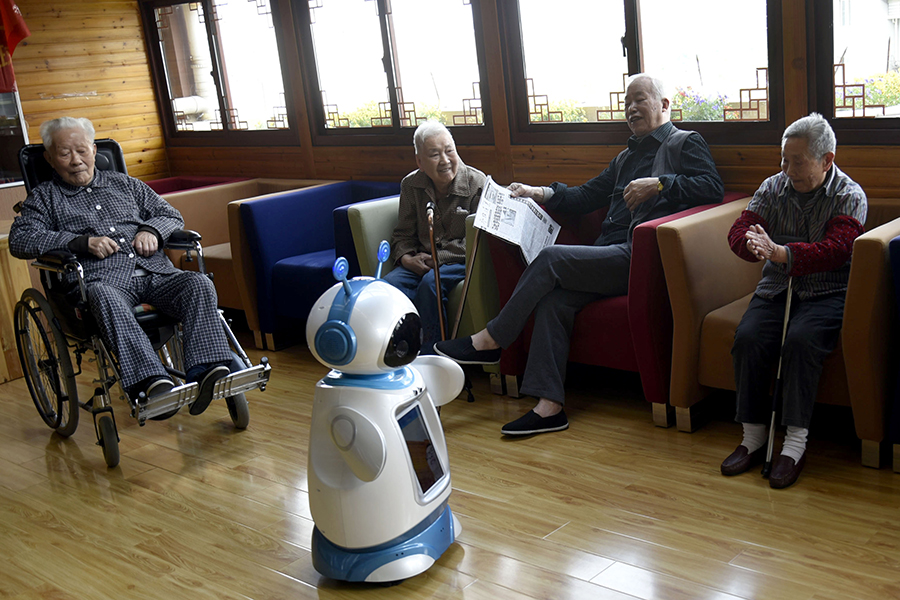 Robots help elderly in nursing home in east China