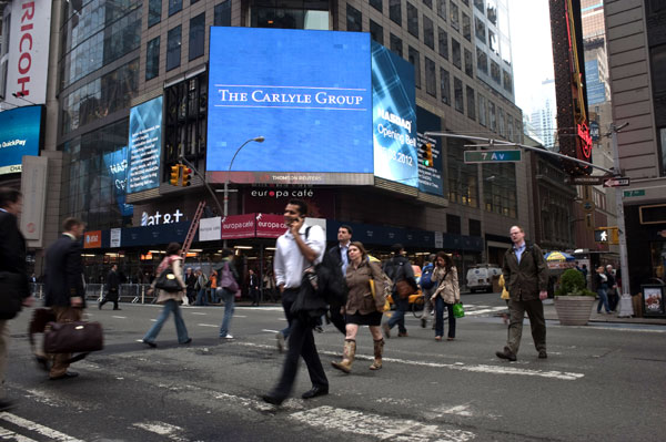 Carlyle buys stake in health checkup firm
