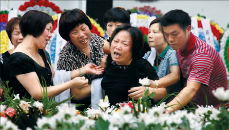 Funeral packed for young couple