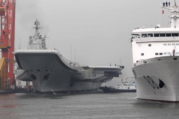 Carrier returns to Dalian after maiden sea trial