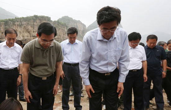 Beijing city leaders mourn flood victims