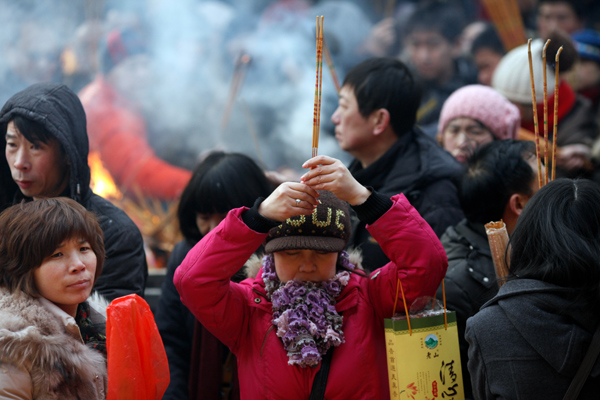 Pray for good fortune in Year of the Snake