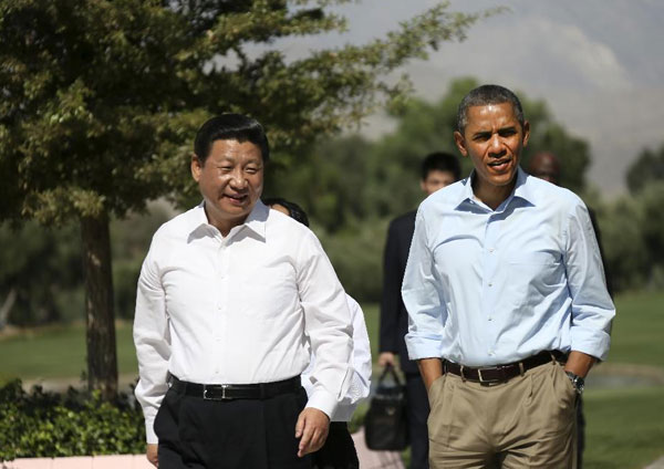 Obama and Xi start talk with a walk