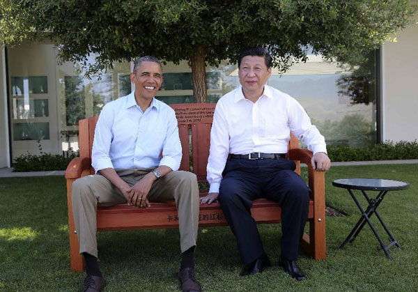 Obama and Xi start talk with a walk