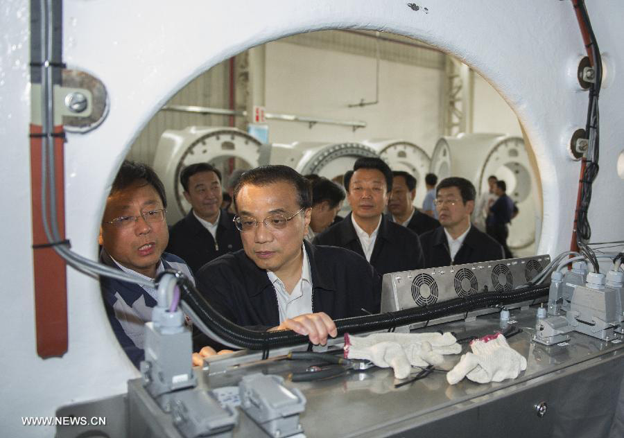 Premier Li urges sustainable development, better livelihood