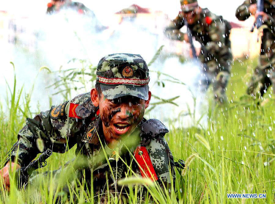 Armed policemen conduct combat exercises in Shanghai