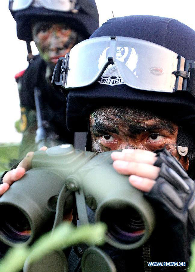 Armed policemen conduct combat exercises in Shanghai