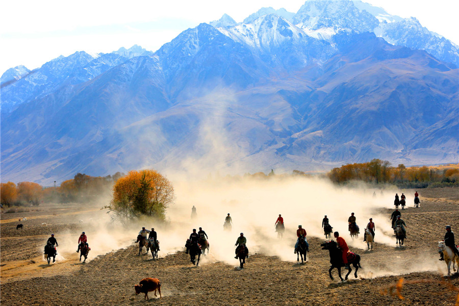 Herdsmen of Tajik ethnic group play traditional game