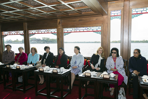 Wives work to boost cultural exchanges among economies