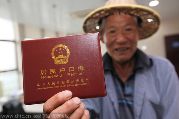 Four regions to scrap urban-rural 'hukou' distinction