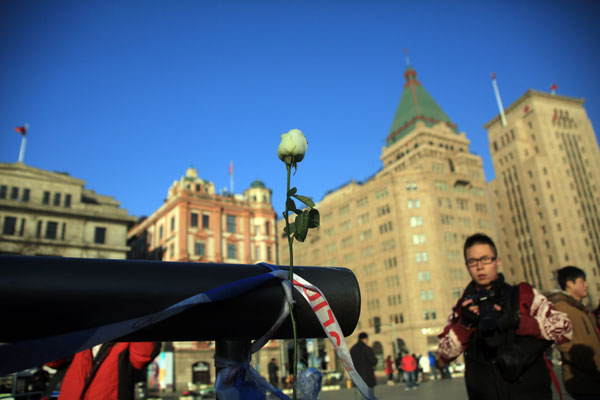 People mourn victims in Shanghai stampede