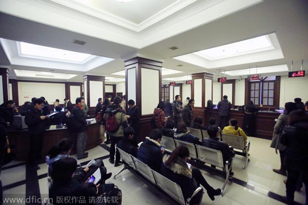 People line up for license plates in Shanghai