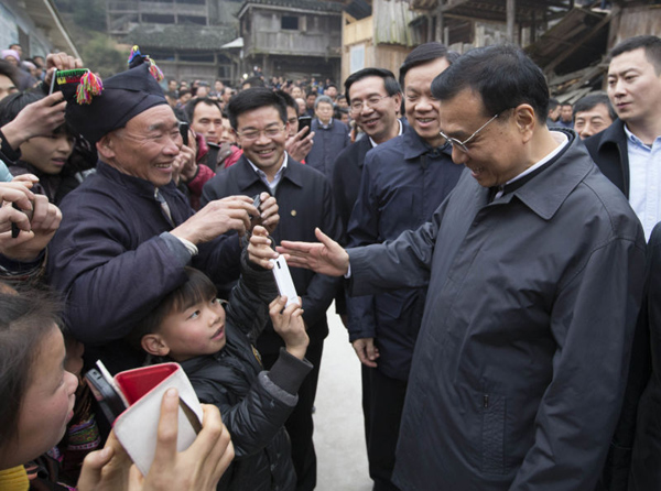 Eight-year-old turns camera on premier