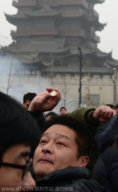 Throwing coins for good luck