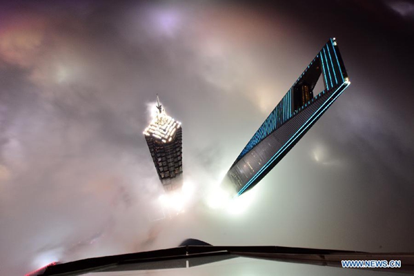 Magnificent scene: buildings amid heavy fog in Shanghai