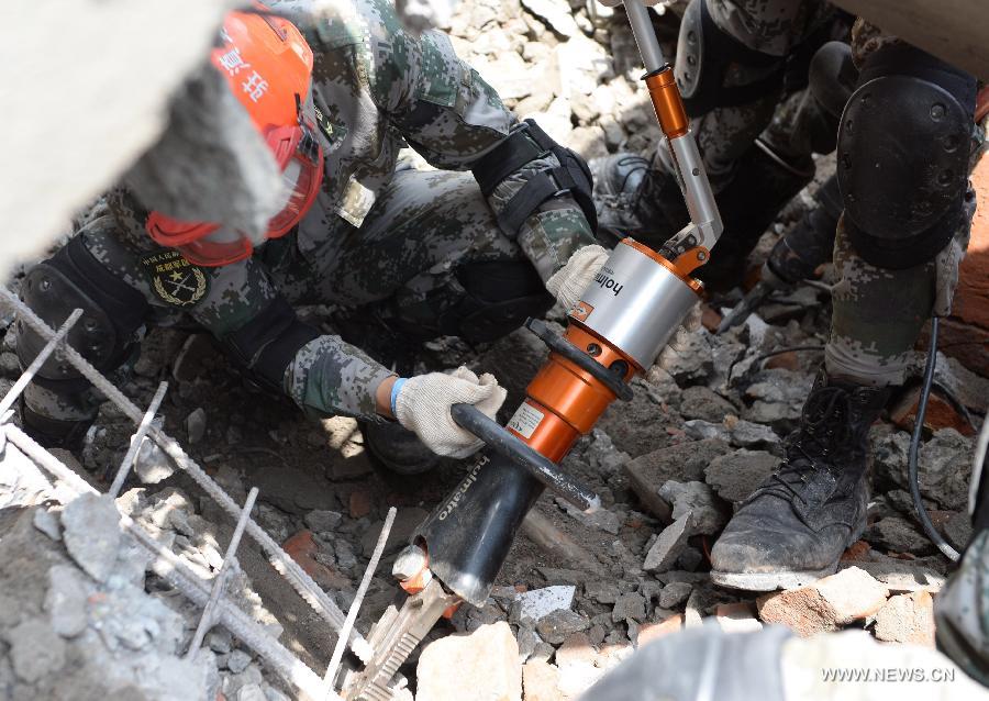 Chinese rescuers work on outskirts of Kathmandu, Nepal