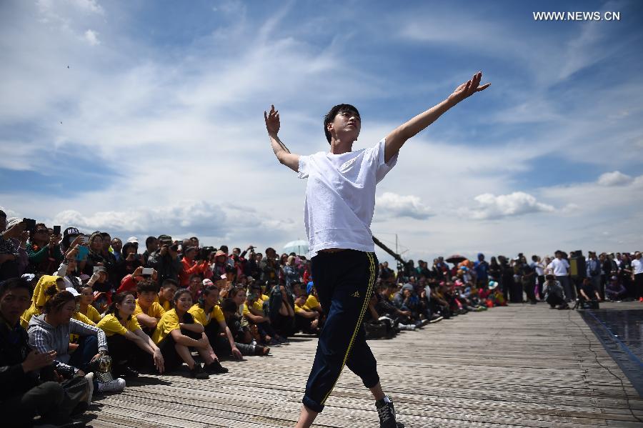 Ballet dancers perform at Zhalong National Nature Reserve in China's Qiqihar