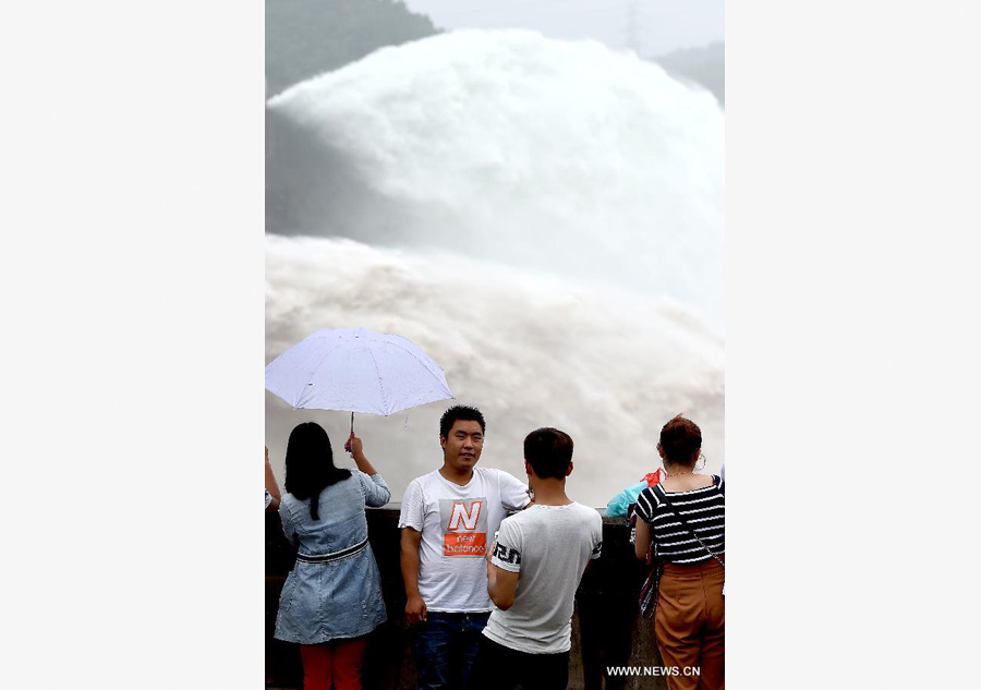 Tourists amazed by artificial water cascades in Henan