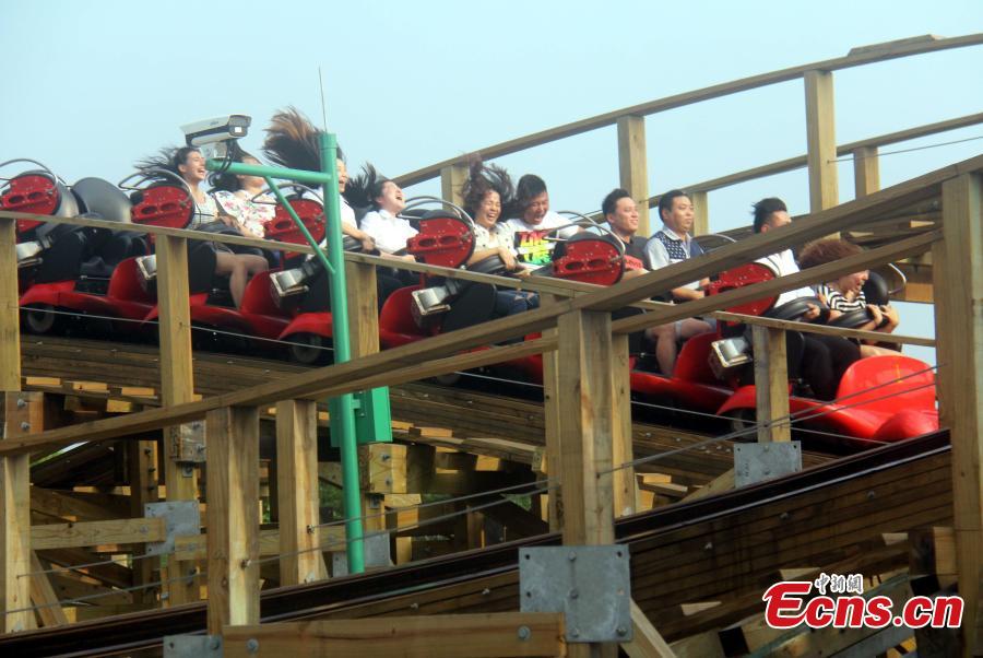 Wooden roller coaster debuts in E China