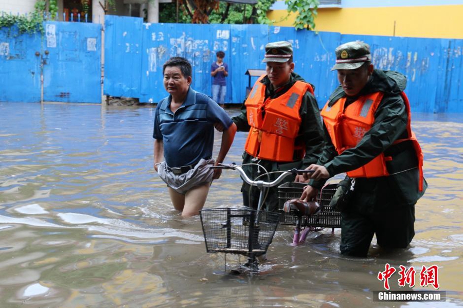 People evacuated after downpour in SW China