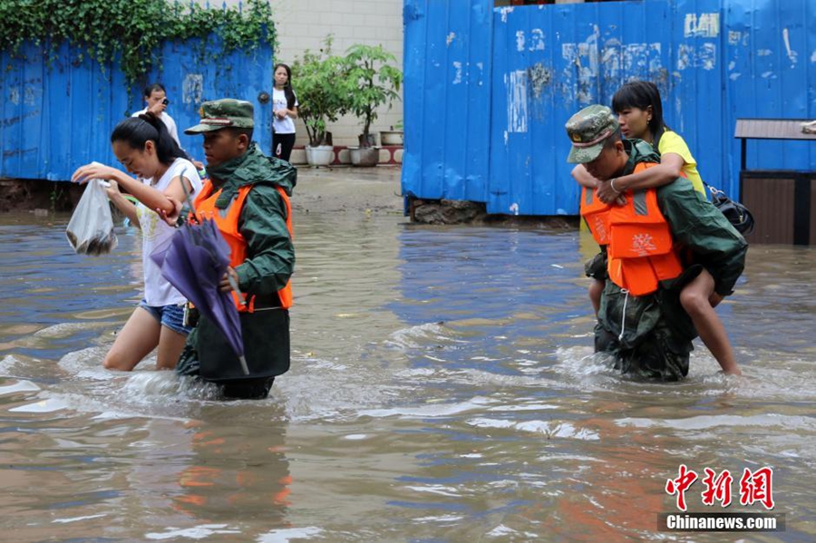 People evacuated after downpour in SW China