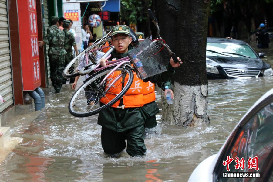 People evacuated after downpour in SW China