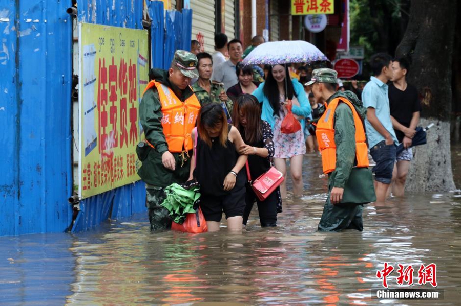 People evacuated after downpour in SW China