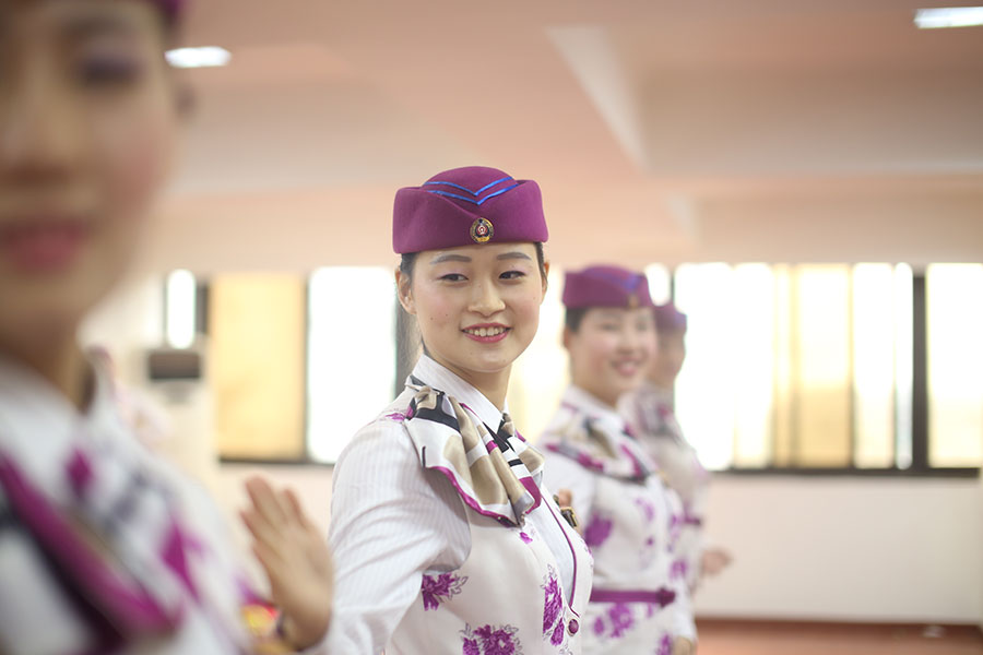 Stewardesses trained to show sweet smile