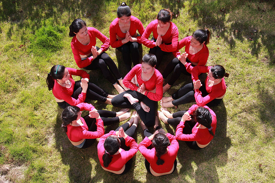 Yoga enthusiasts in harmony with nature