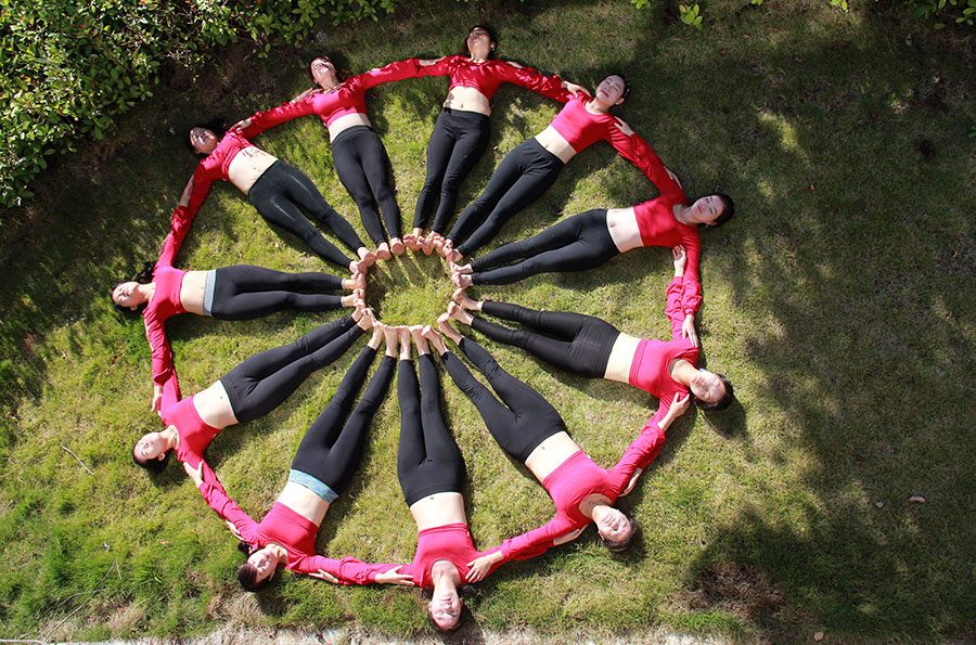 Yoga enthusiasts in harmony with nature