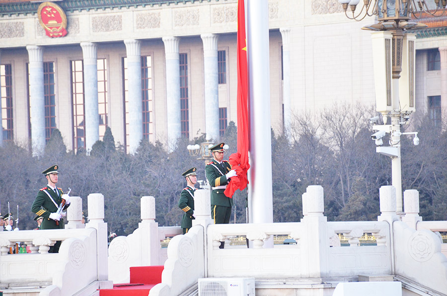 Practice makes perfect for flag party on eve of Year of the Monkey