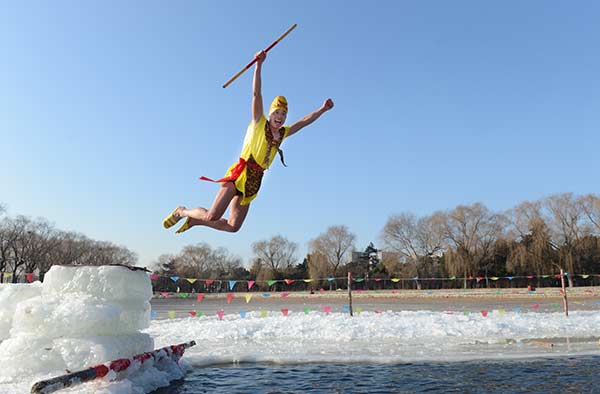 Winter swim enthusiasts celebrate the Year of the Monkey