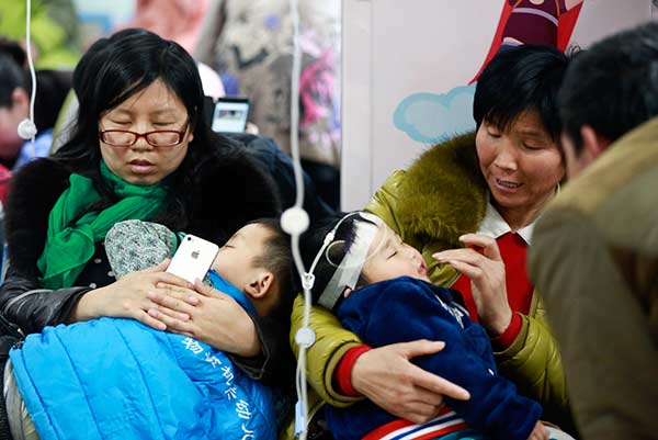 Thousands of kids fall ill with the flu in Beijing