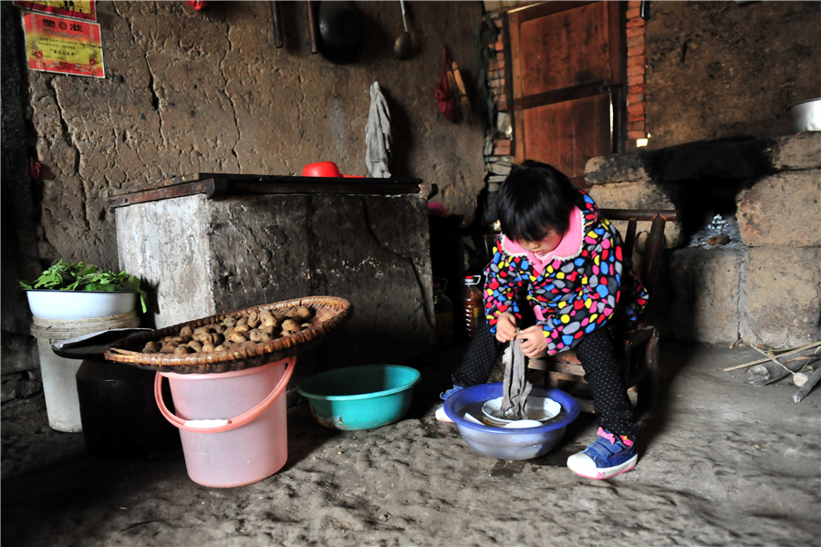 Seven-year-old village kid cares for her grandparents