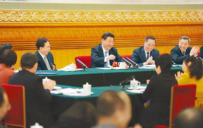 In photos: What Xi said to NPC in the past three years