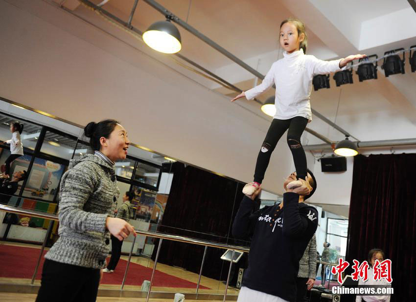 Twin brothers and sisters get married, form acrobatics team