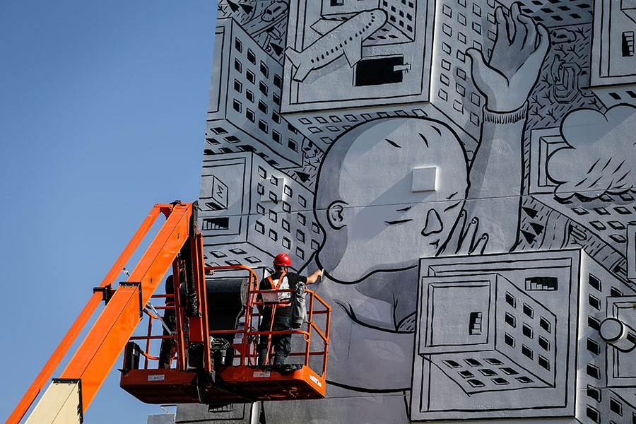 Italian muralist Millo adds color to Shanghai's skyline