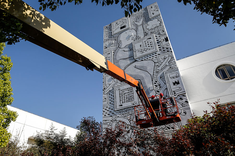 Italian muralist Millo adds color to Shanghai's skyline