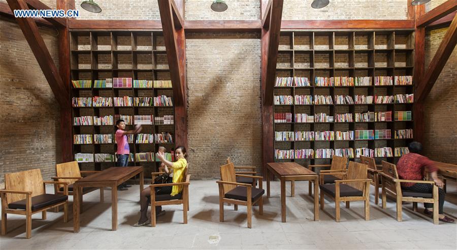 Library modified from cave dwellings attracts readers in NW China